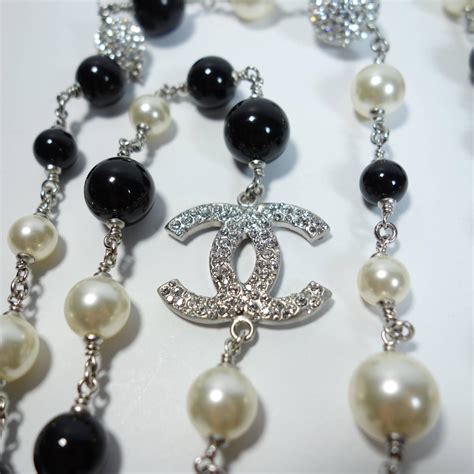 chanel necklace black and white pearls|Chanel necklace price list.